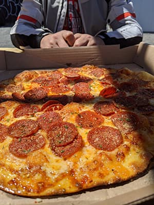 Customer review image of pizza from Sav